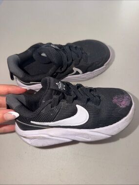 Nike Kids Black Sneakers with White Swoosh and Pink Accent